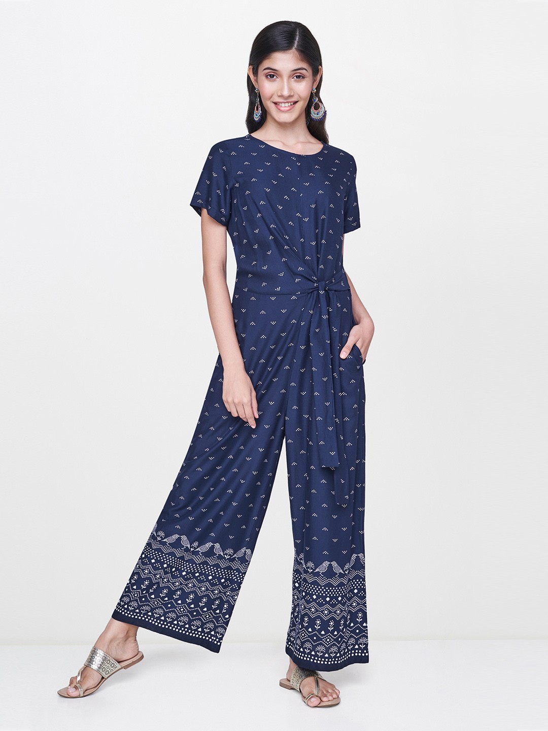 

Global Desi Women Blue & White Printed Basic Jumpsuit with Waist Tie-Ups