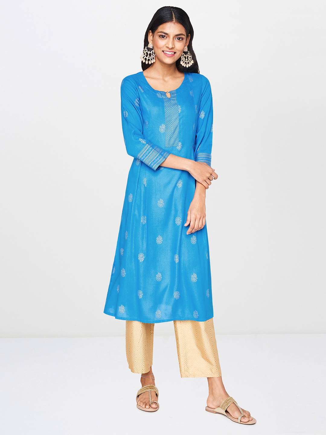 

Global Desi Women Blue & Golden Printed Straight Kurta with Pleats
