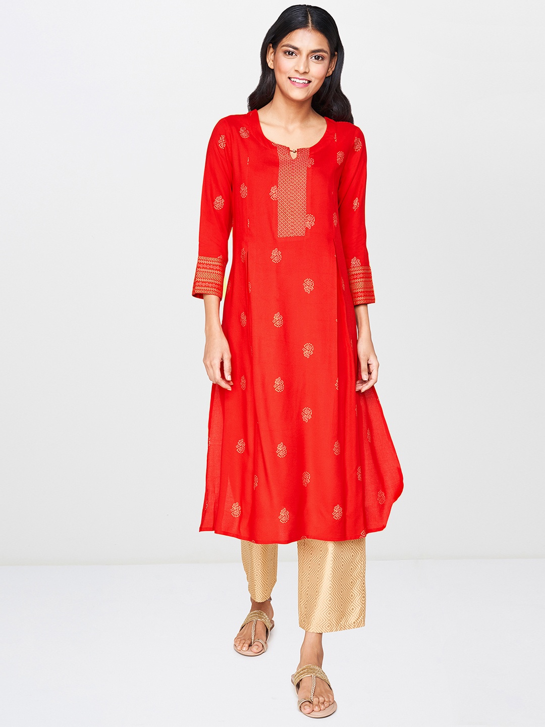 

Global Desi Women Red & Golden Printed Straight Kurta with Pleats