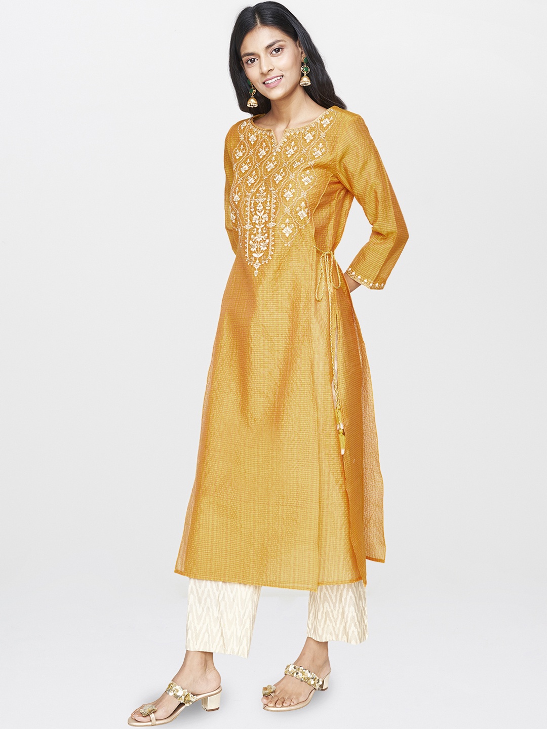 

Global Desi Women Mustard Yellow & Gold-Toned Embroidered Layered A-Line Kurta