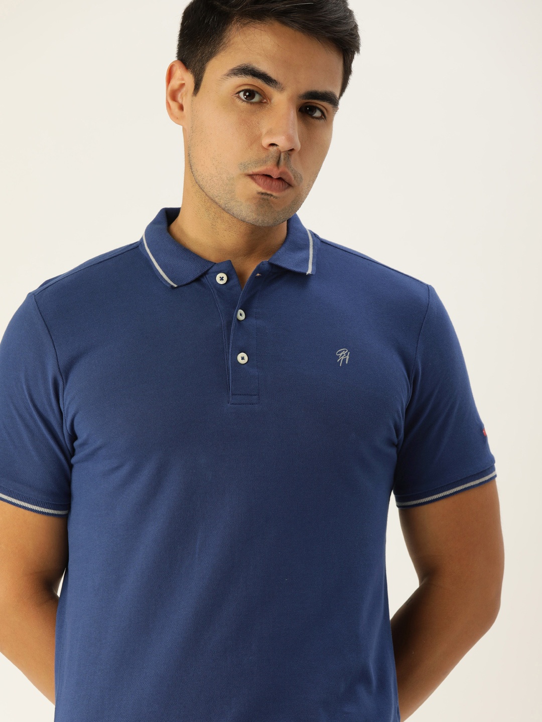 

Being Human Men Blue Solid Polo Collar T-shirt