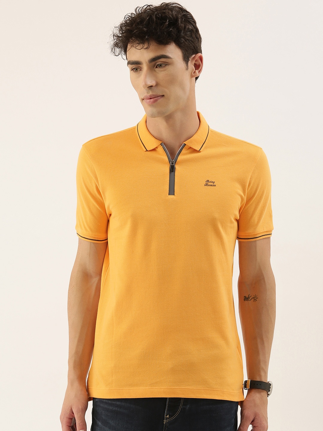

Being Human Men Yellow Solid Polo Collar Pure Cotton T-shirt