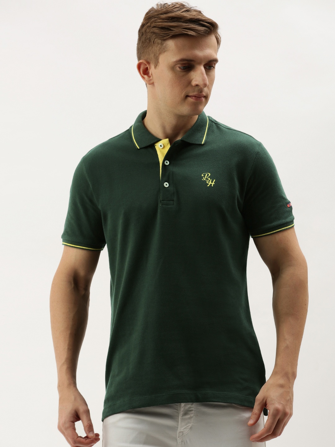 

Being Human Men Green Solid Polo Collar Pure Cotton T-shirt