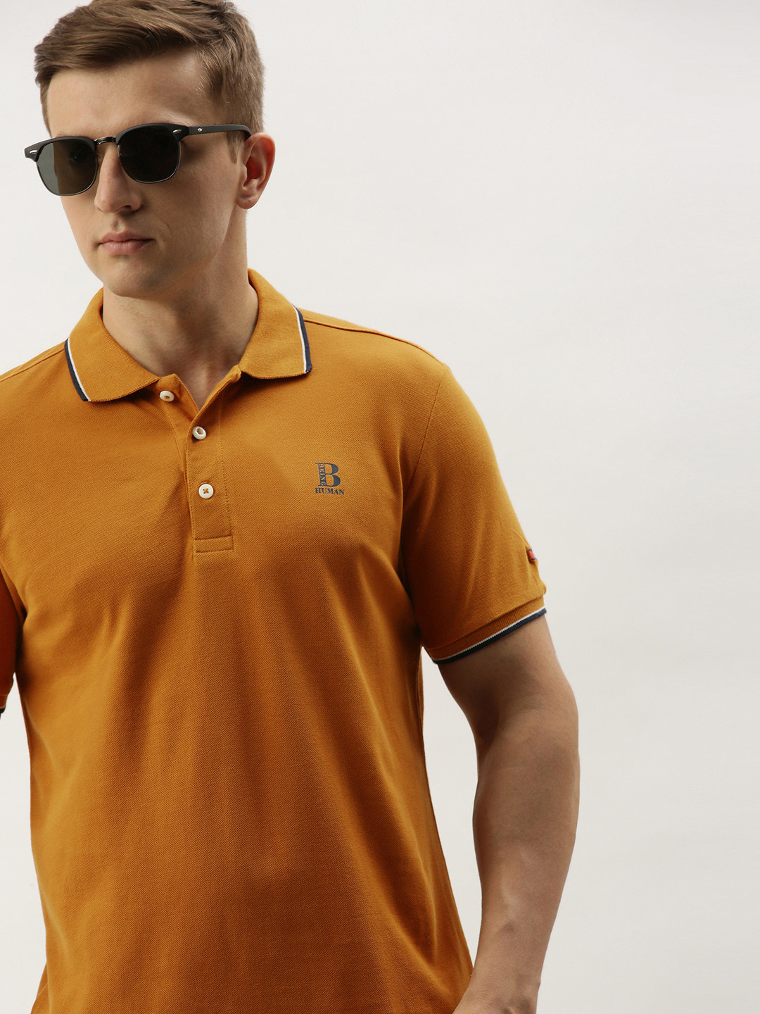 

Being Human Men Rust Orange Solid Polo Collar Pure Cotton T-shirt