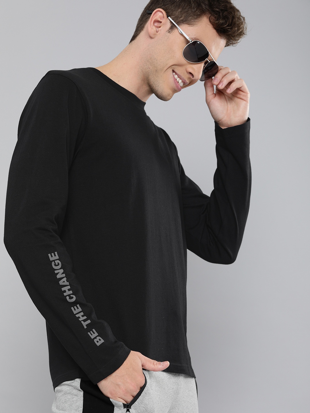 

HERENOW Men Black Solid Round Neck Pure Cotton T-shirt with Printed Detail