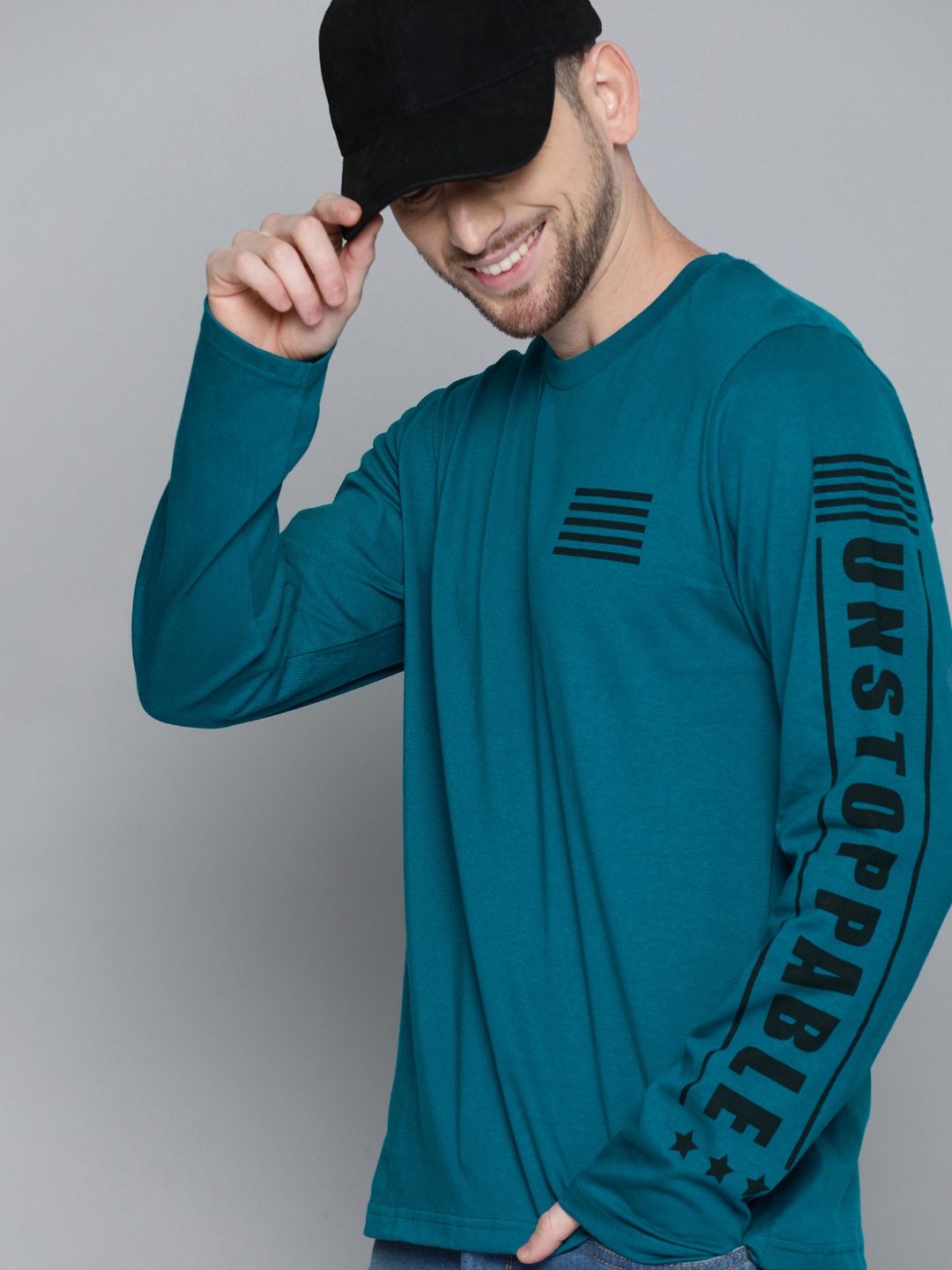 

HERENOW Men Teal Blue Solid Round Neck Pure Cotton T-shirt with Printed Sleeve