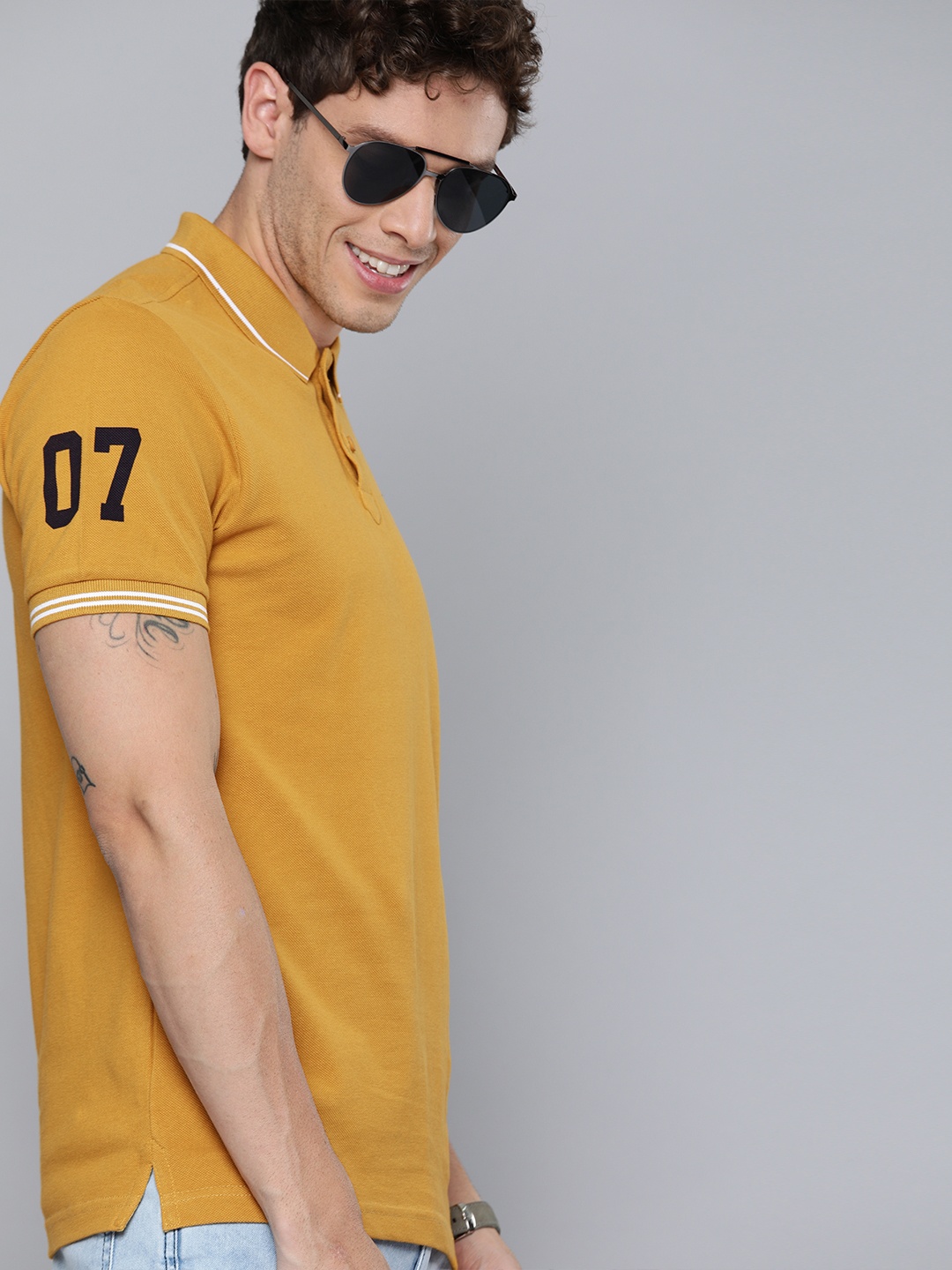 

HERENOW Men Mustard Yellow Solid Polo Collar Pure Cotton T-shirt