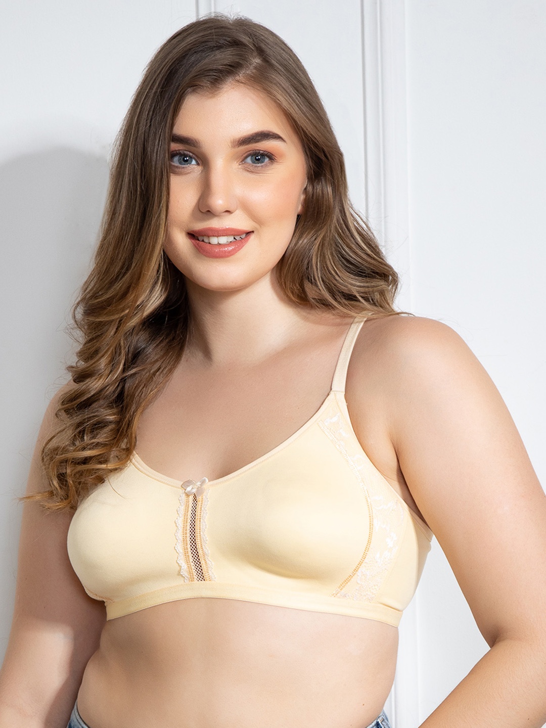 

Clovia Beige Solid Non-Wired Non Padded T-shirt Bra BR2078P2432E