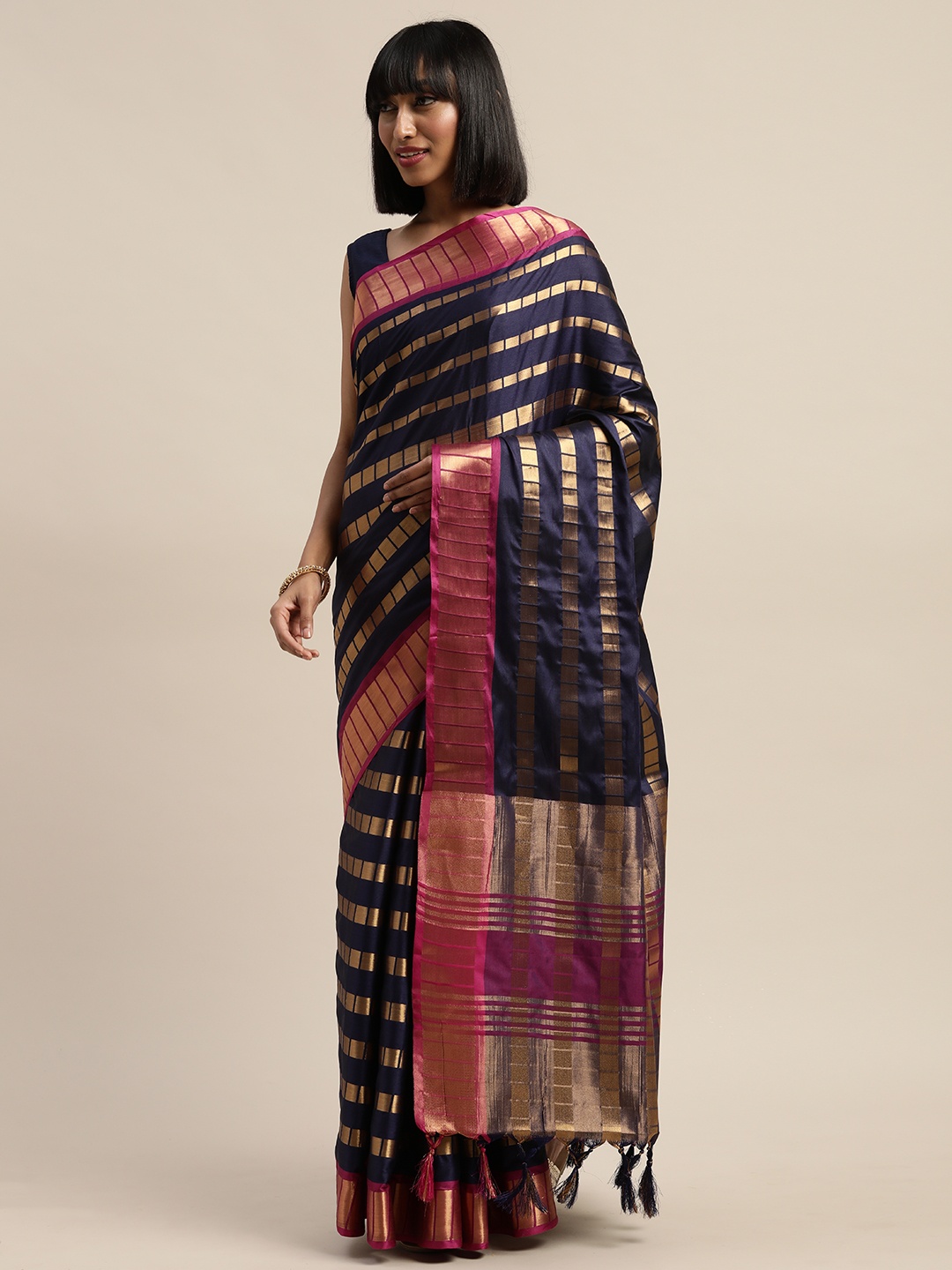 

KALINI Purple & Gold-Toned Poly Silk Striped Saree