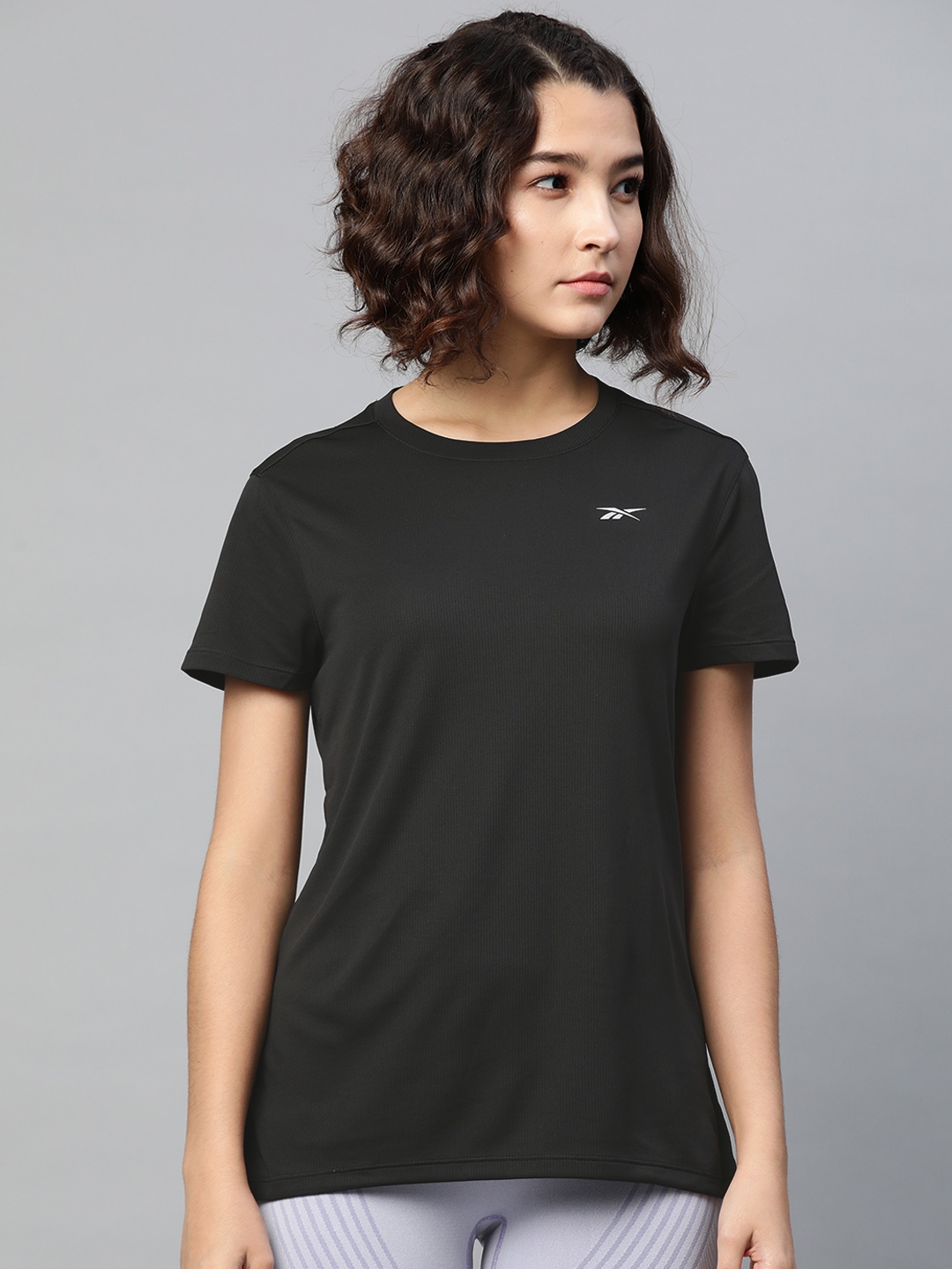 

Reebok Women Black Slim Fit Solid Running T-shirt