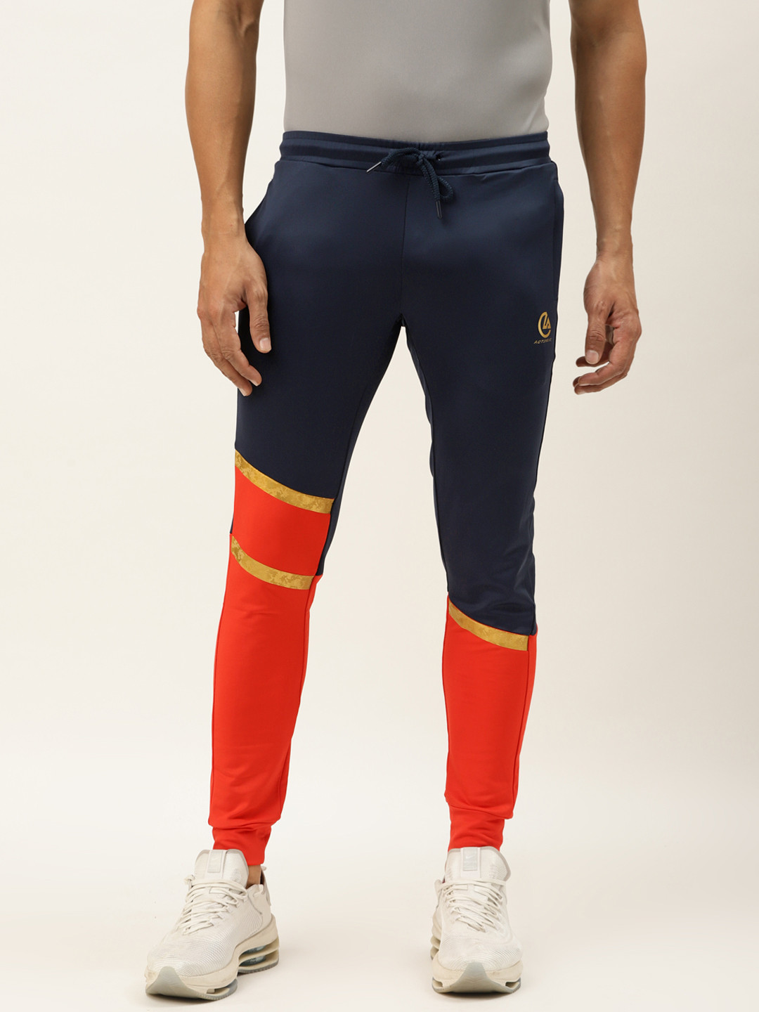 

ACTOHOLIC Men Navy Blue & Coral Orange Colourblocked Joggers