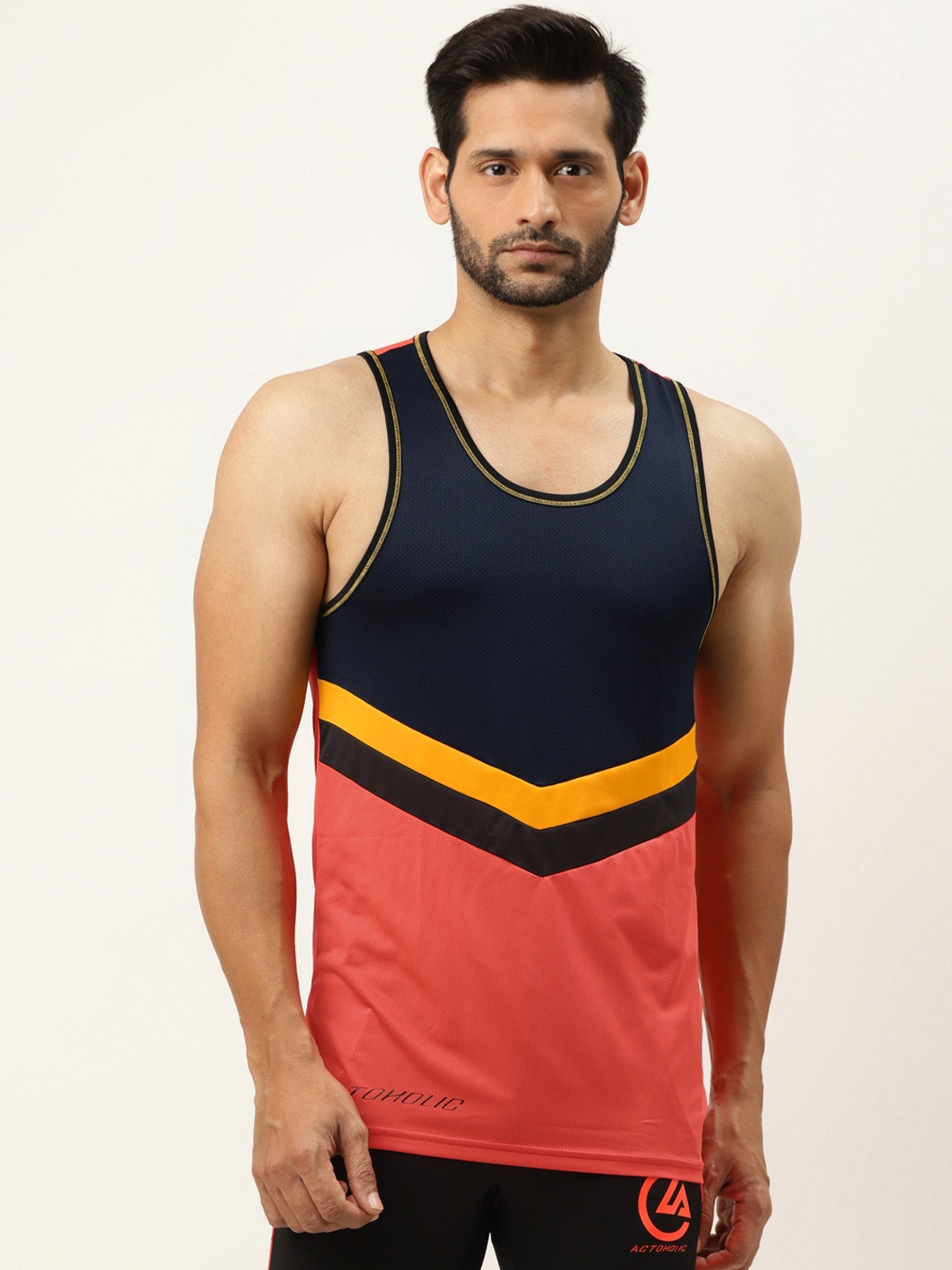 

ACTOHOLIC Men Coral Pink & Navy Colourblocked Round Neck T-shirt