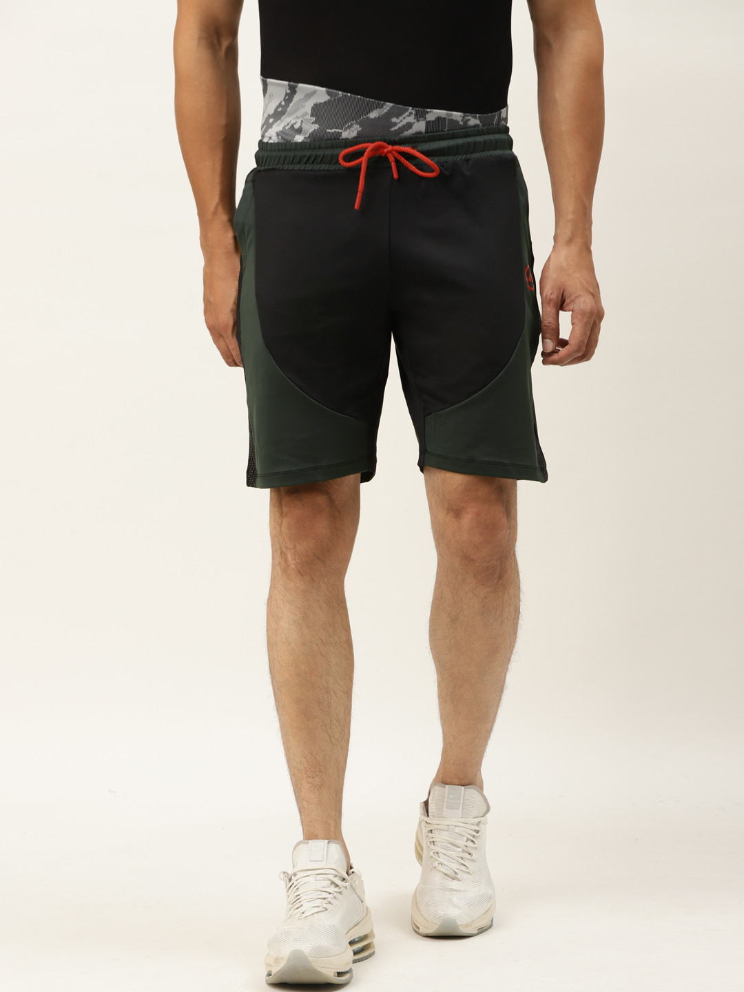 

ACTOHOLIC Men Black & Green Colourblocked Regular Fit Sports Shorts
