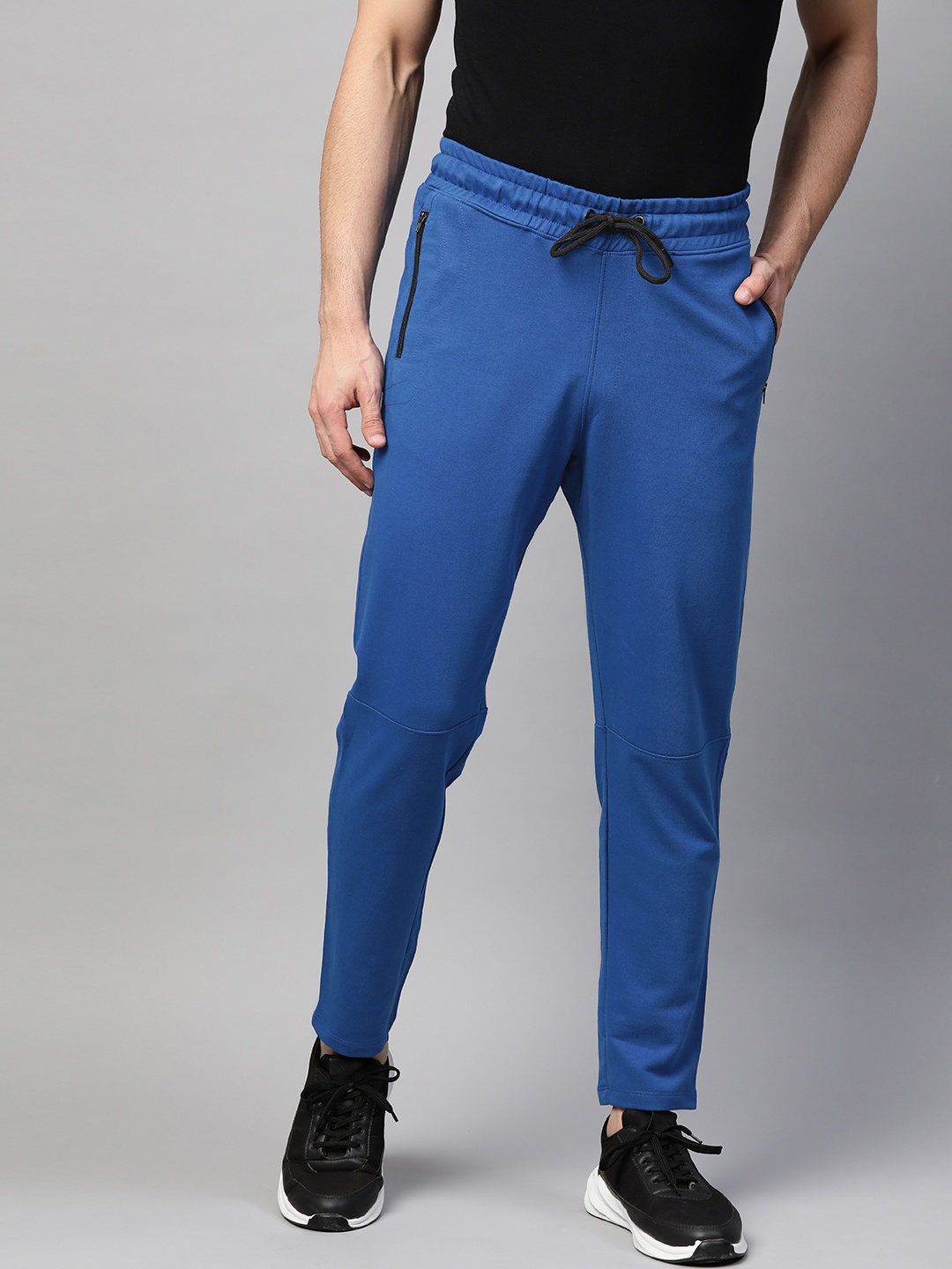 

ManQ CASUAL Men Blue Solid Slim Fit Track Pants