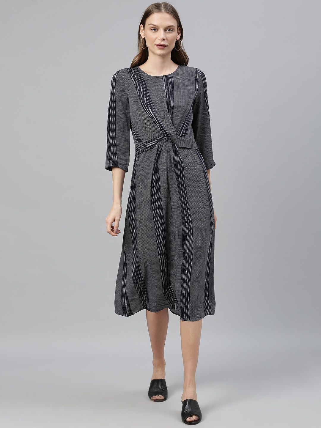 

Vero Moda Women Navy Blue & White Printed Twisted Fit and Flare Dress