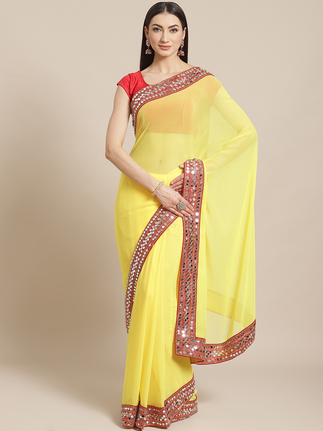

VASTRANAND Yellow Solid Saree