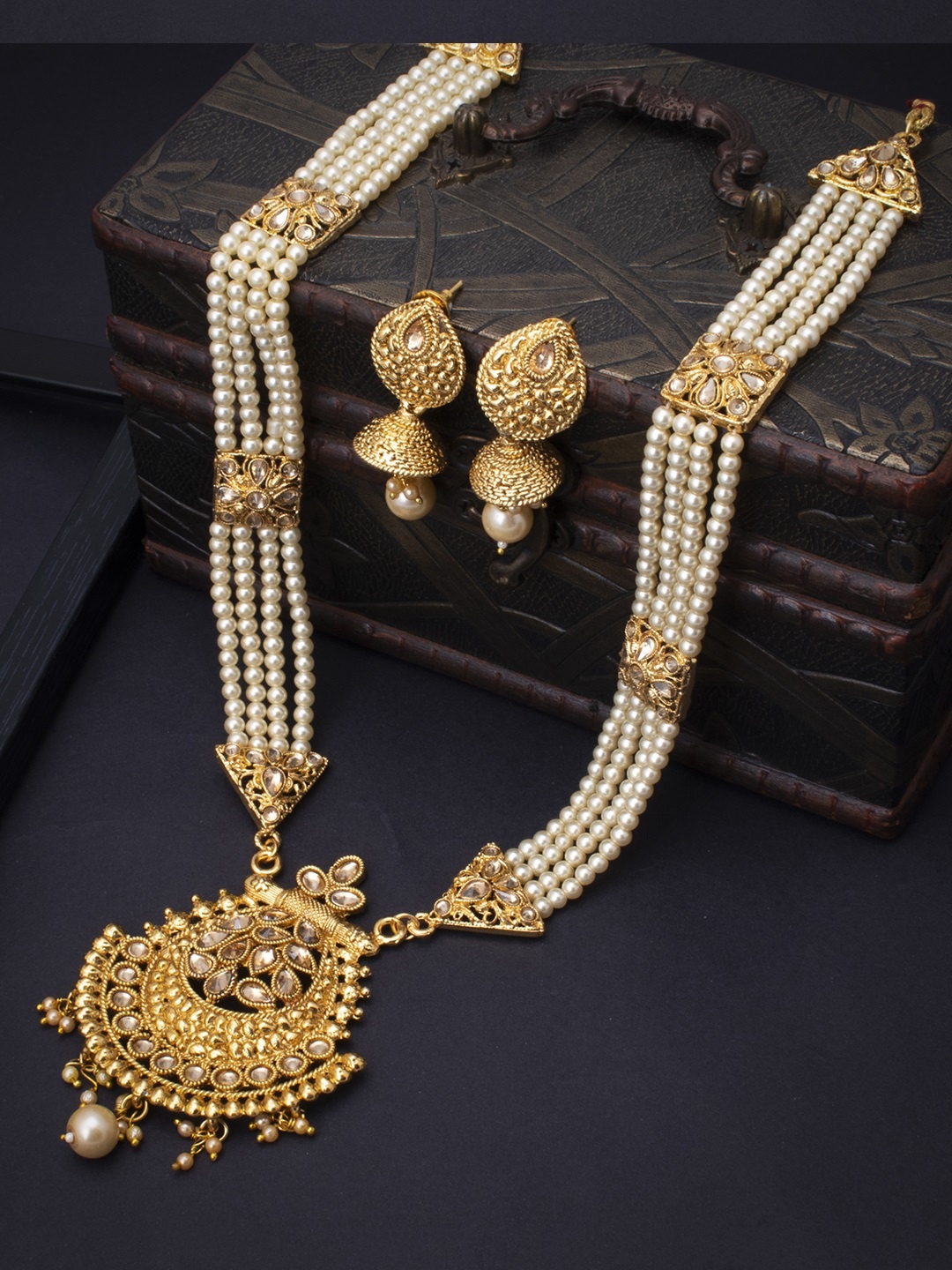 

Sukkhi LCT Gold-Plated Off-White Stone-Studded Pearl Beaded Antique Jewellery Set