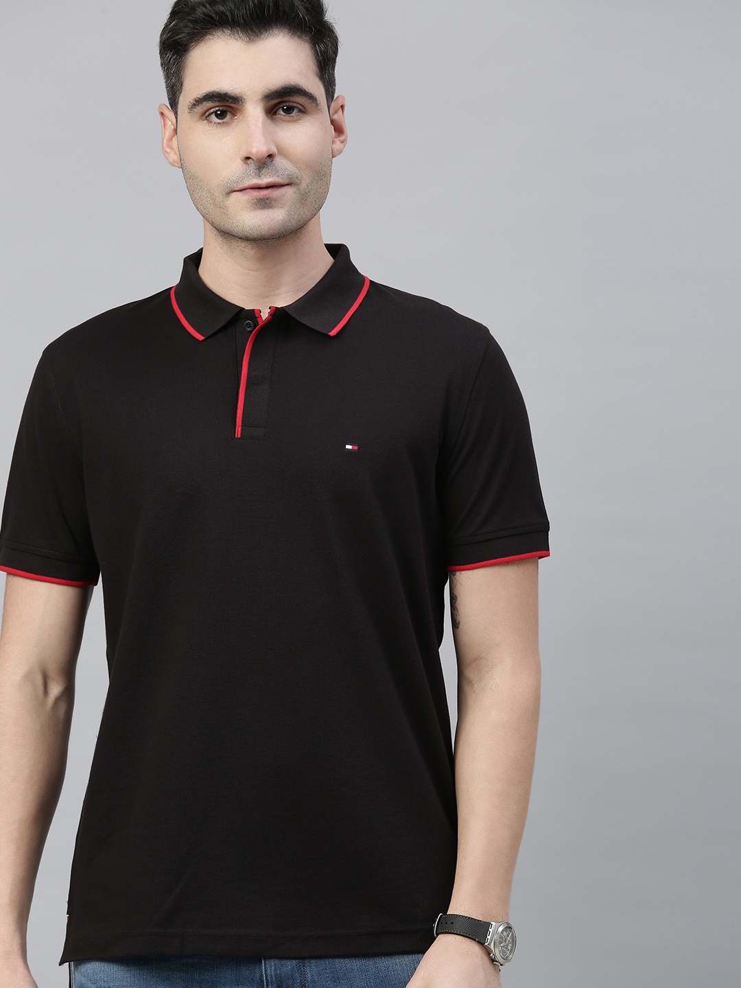 

Tommy Hilfiger Men Black Solid Polo Collar T-shirt