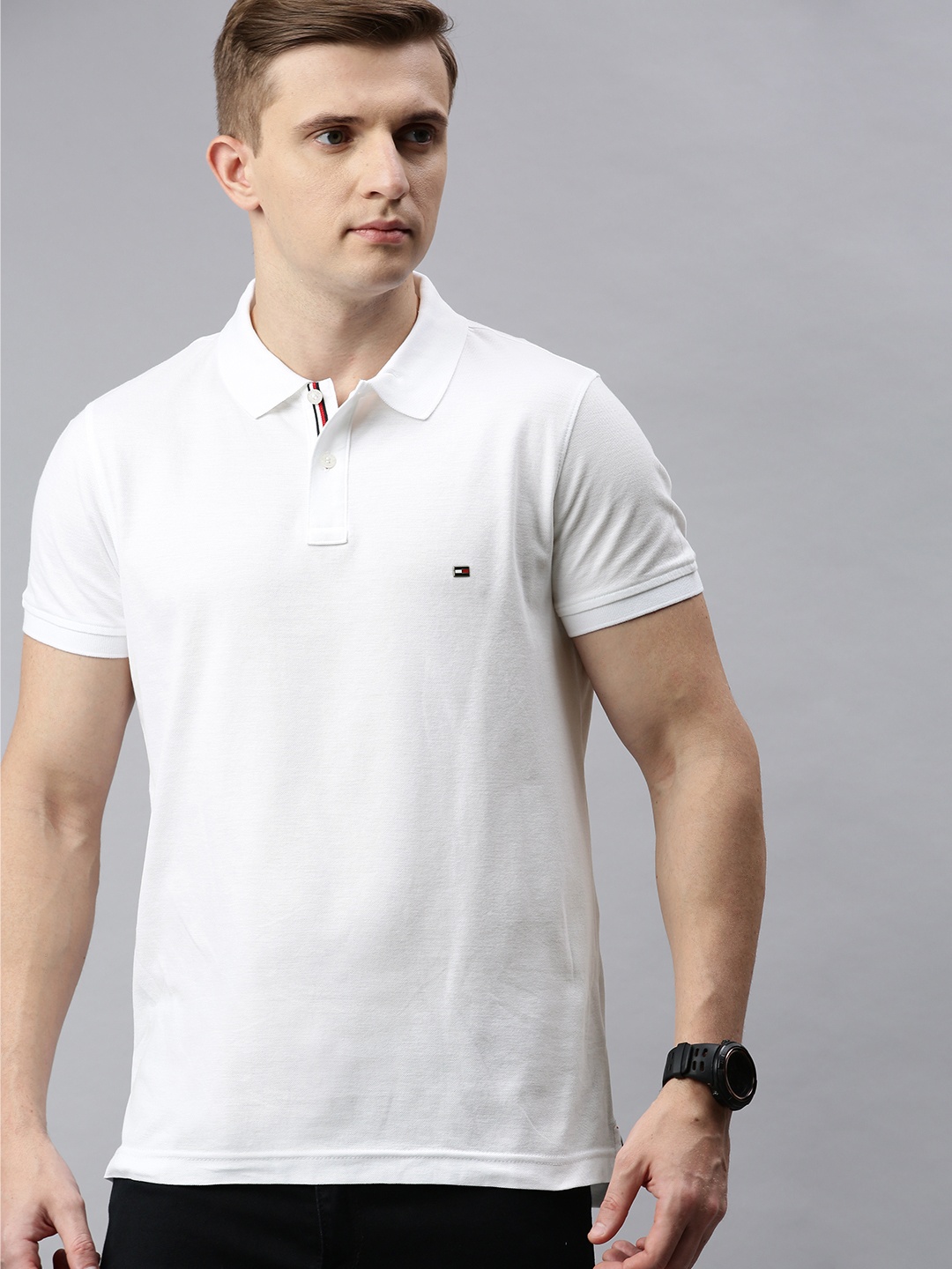 

Tommy Hilfiger Men White Slim Fit Solid Polo Collar Pure Cotton T-shirt