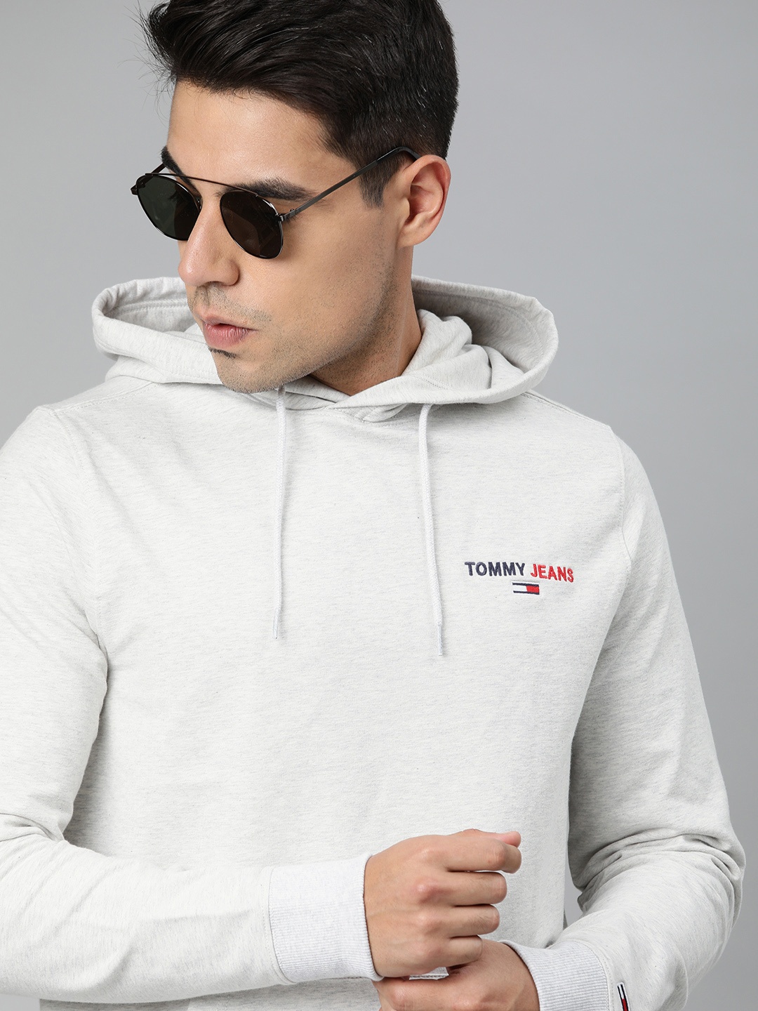 

Tommy Hilfiger Men Grey Melange Solid Hooded Sweatshirt