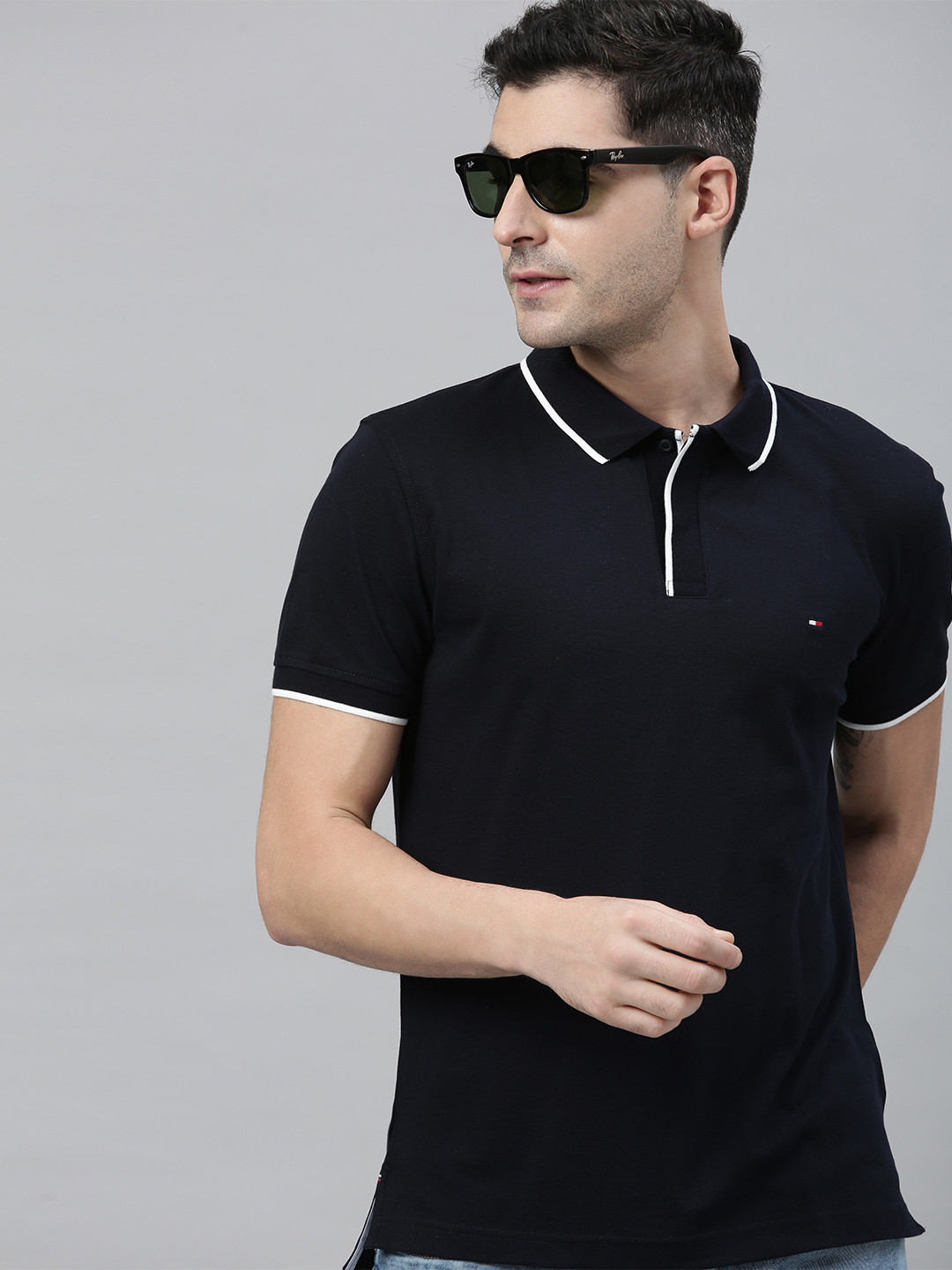 

Tommy Hilfiger Men Navy Blue Solid Polo Collar T-shirt