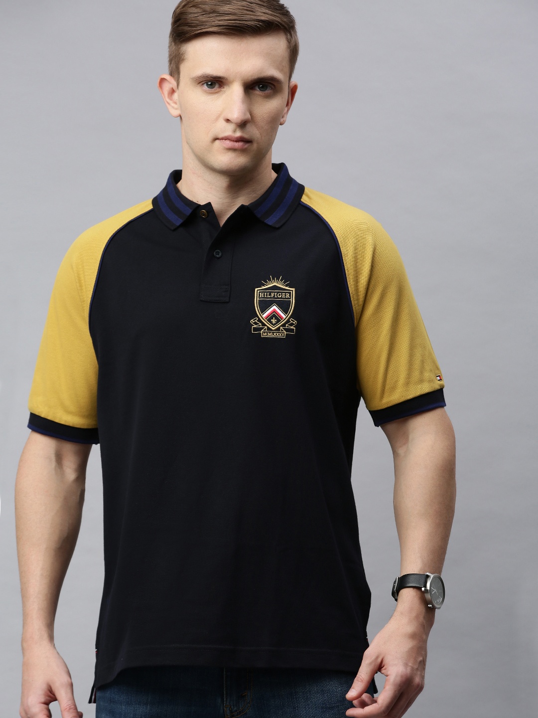 

Tommy Hilfiger Men Navy Blue Solid Polo Collar Pure Cotton T-shirt