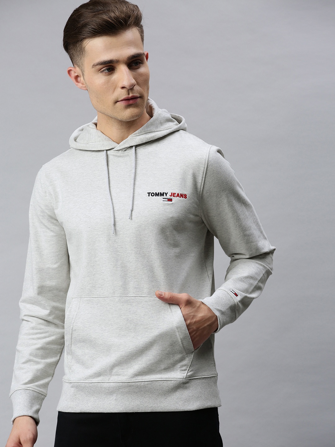 

Tommy Hilfiger Men Grey Melange Solid Hooded Sweatshirt