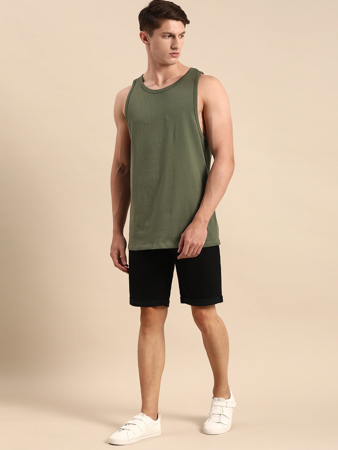 

ether Men Olive Green Solid Round Neck Sleeveless Pure Cotton T-shirt