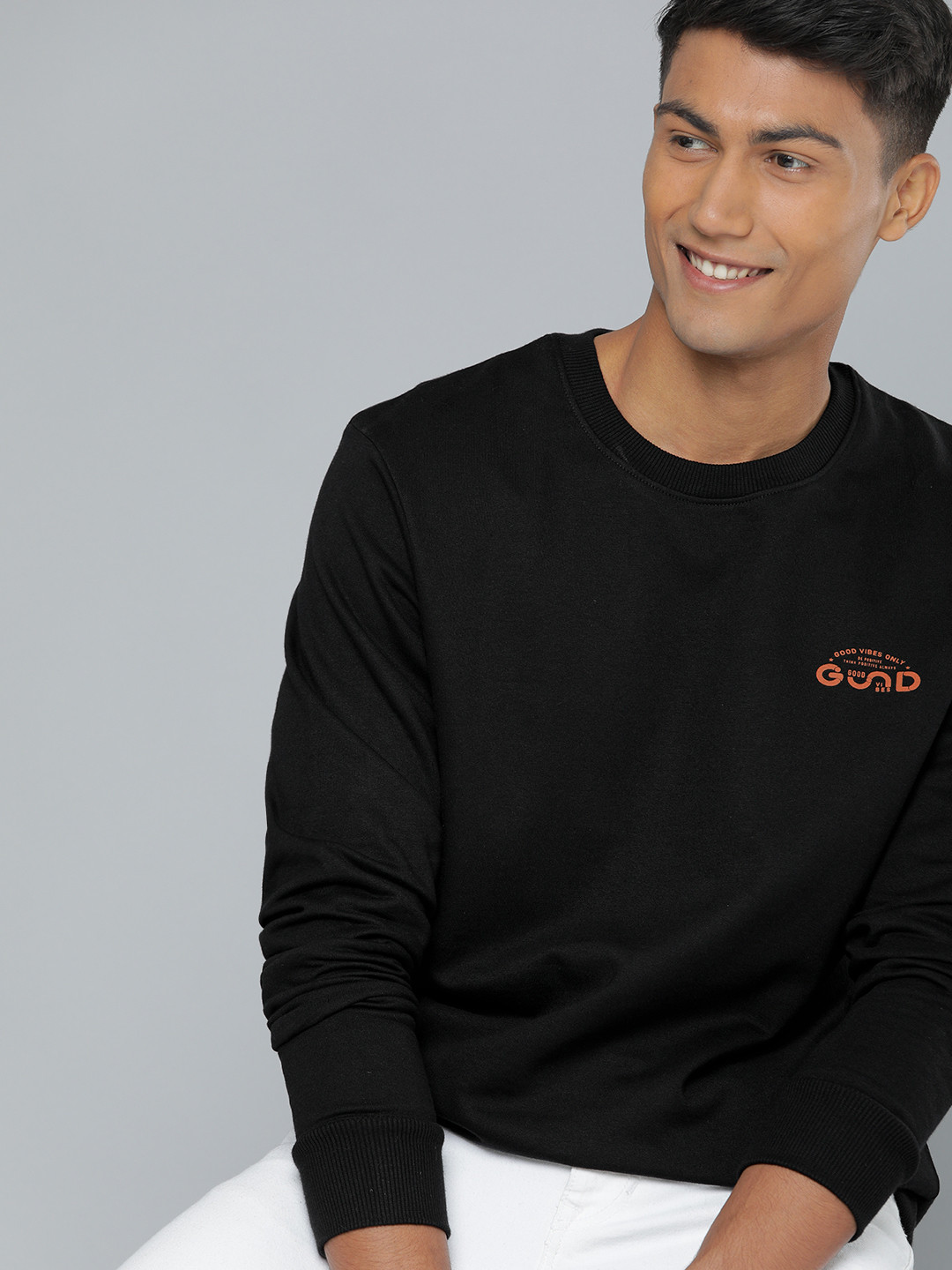 

HERE&NOW Men Black Solid Sweatshirt