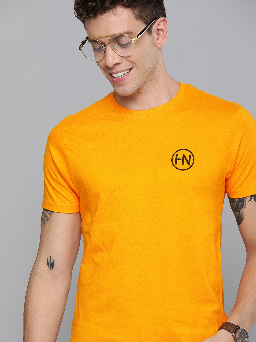 

HERENOW Men Mustard Yellow Solid Round Neck Pure Cotton T-shirt