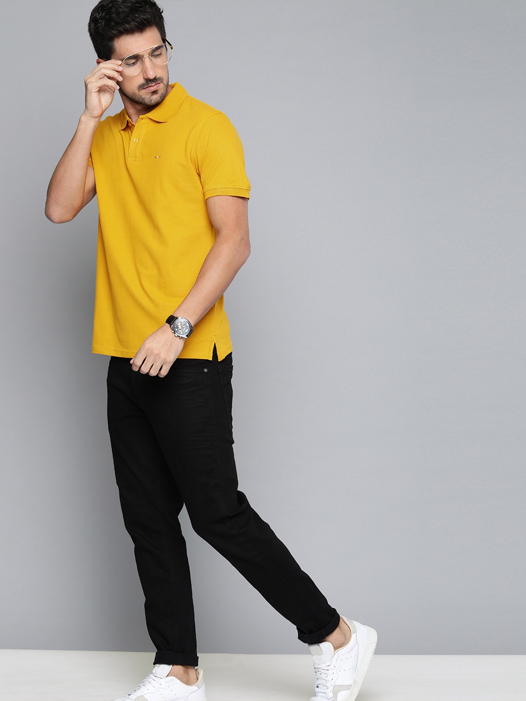 

Harvard Men Mustard Yellow Solid Polo Collar T-shirt