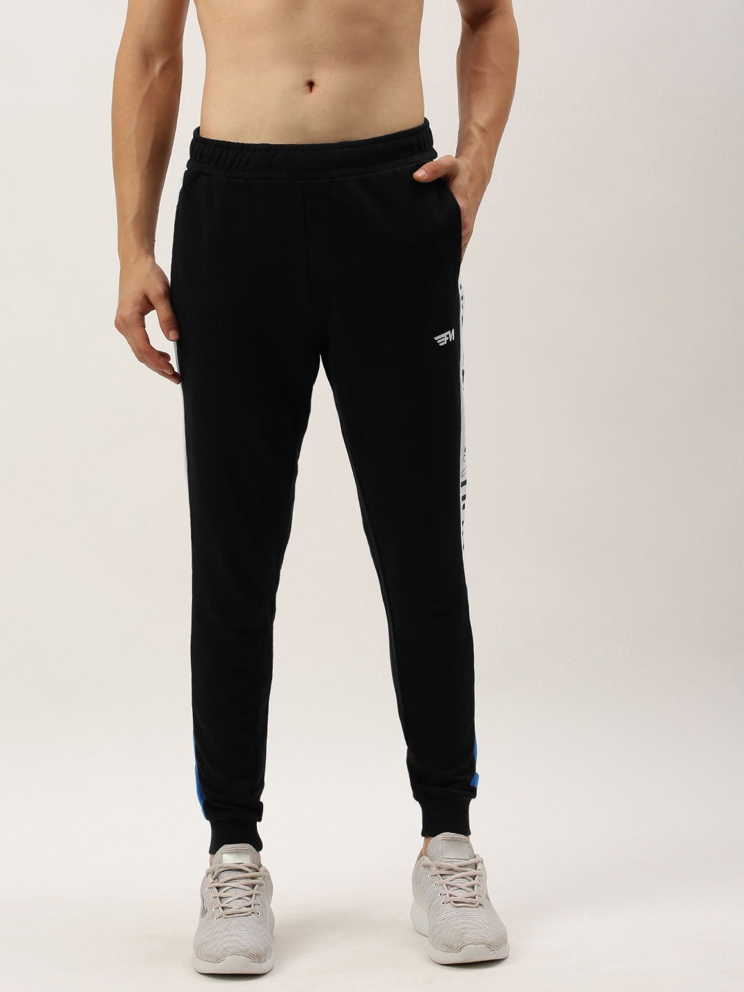 

Flying Machine Men Black Solid Joggers with Printed Detail
