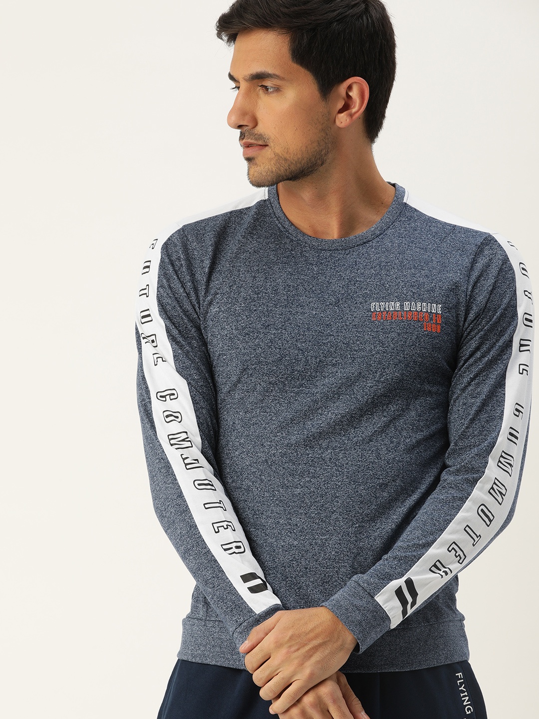 

Flying Machine Men Navy Blue Solid Round Neck T-shirt with Printed Sleeve