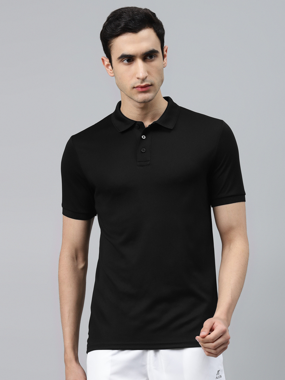 

Alcis Men Black Solid Polo Collar T-shirt