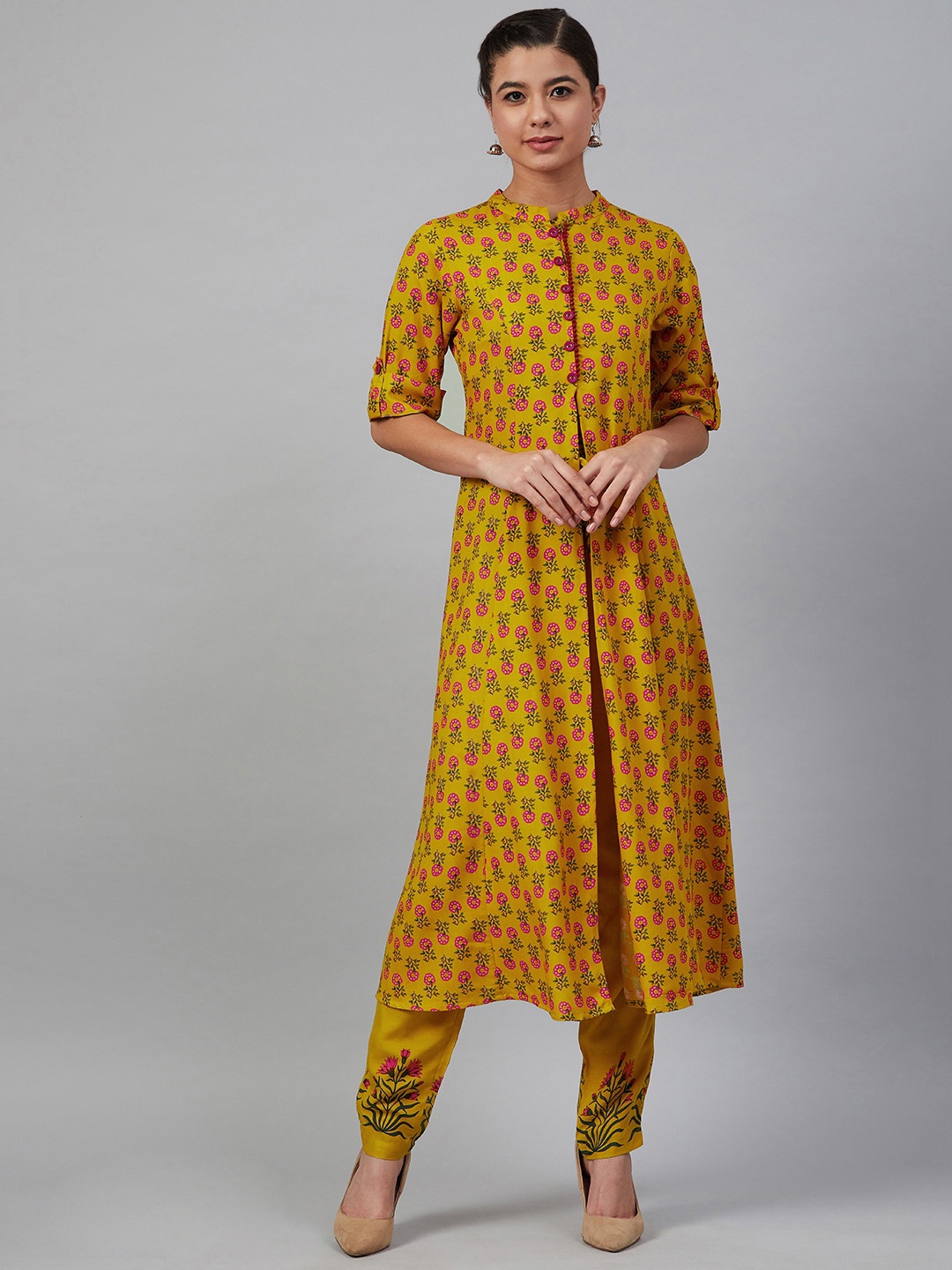 

Meeranshi Women Mustard Yellow & Pink Printed Kurta with Trousers