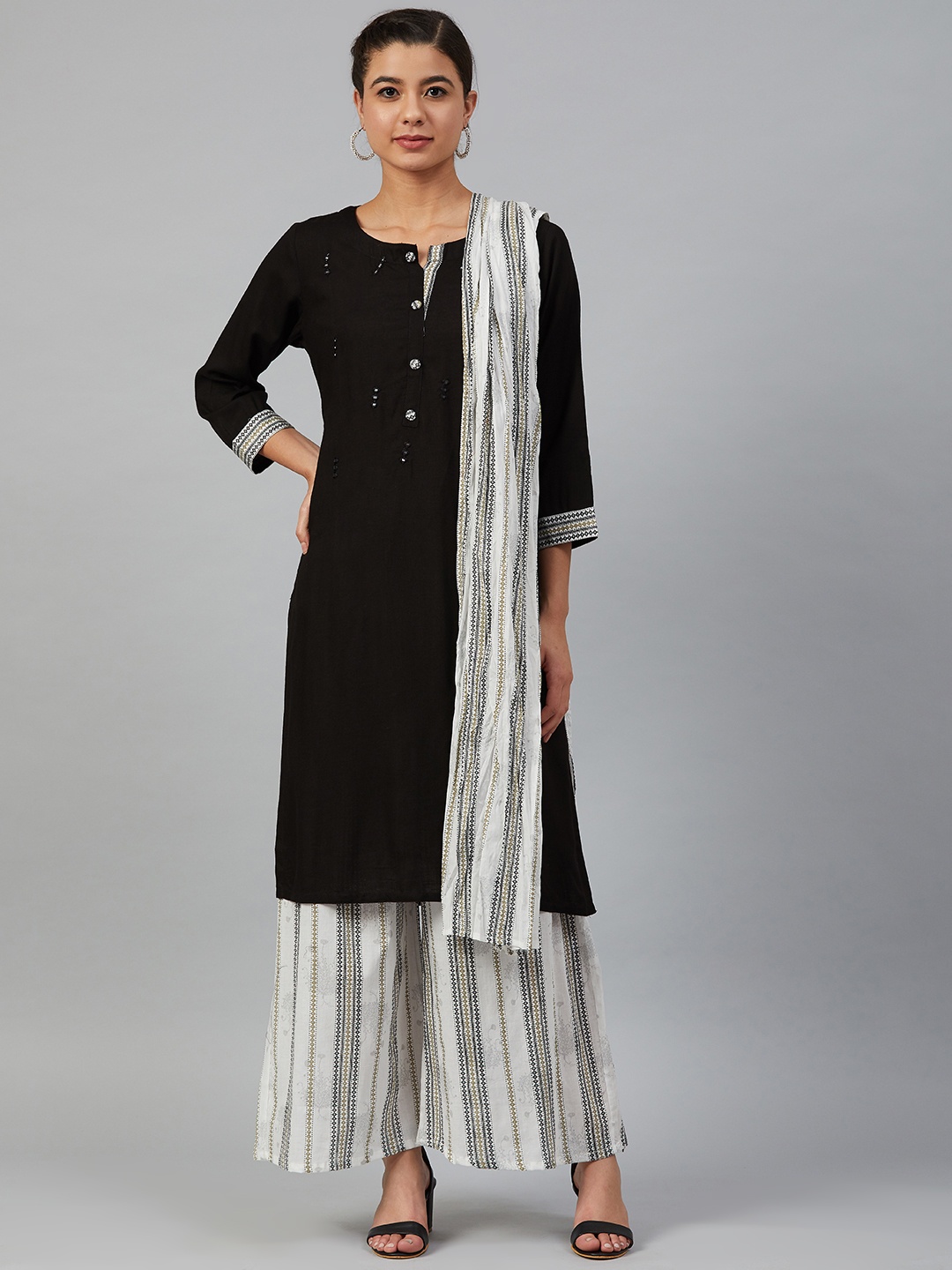 

Meeranshi Women Black & White Mirror Work Yoke Design Kurta with Palazzos & Dupatta
