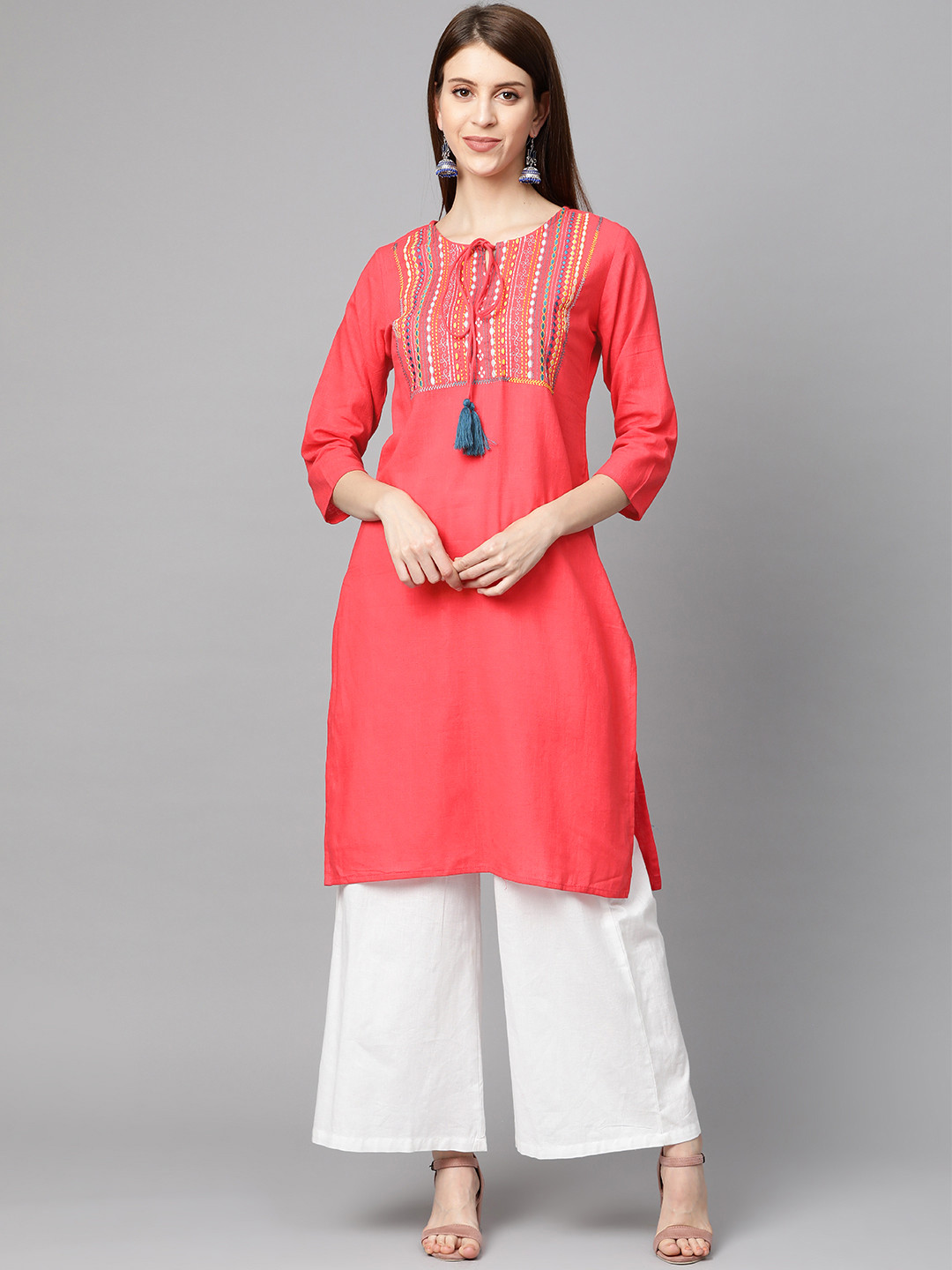 

Meeranshi Women Coral Pink Yoke Design Straight Kurta