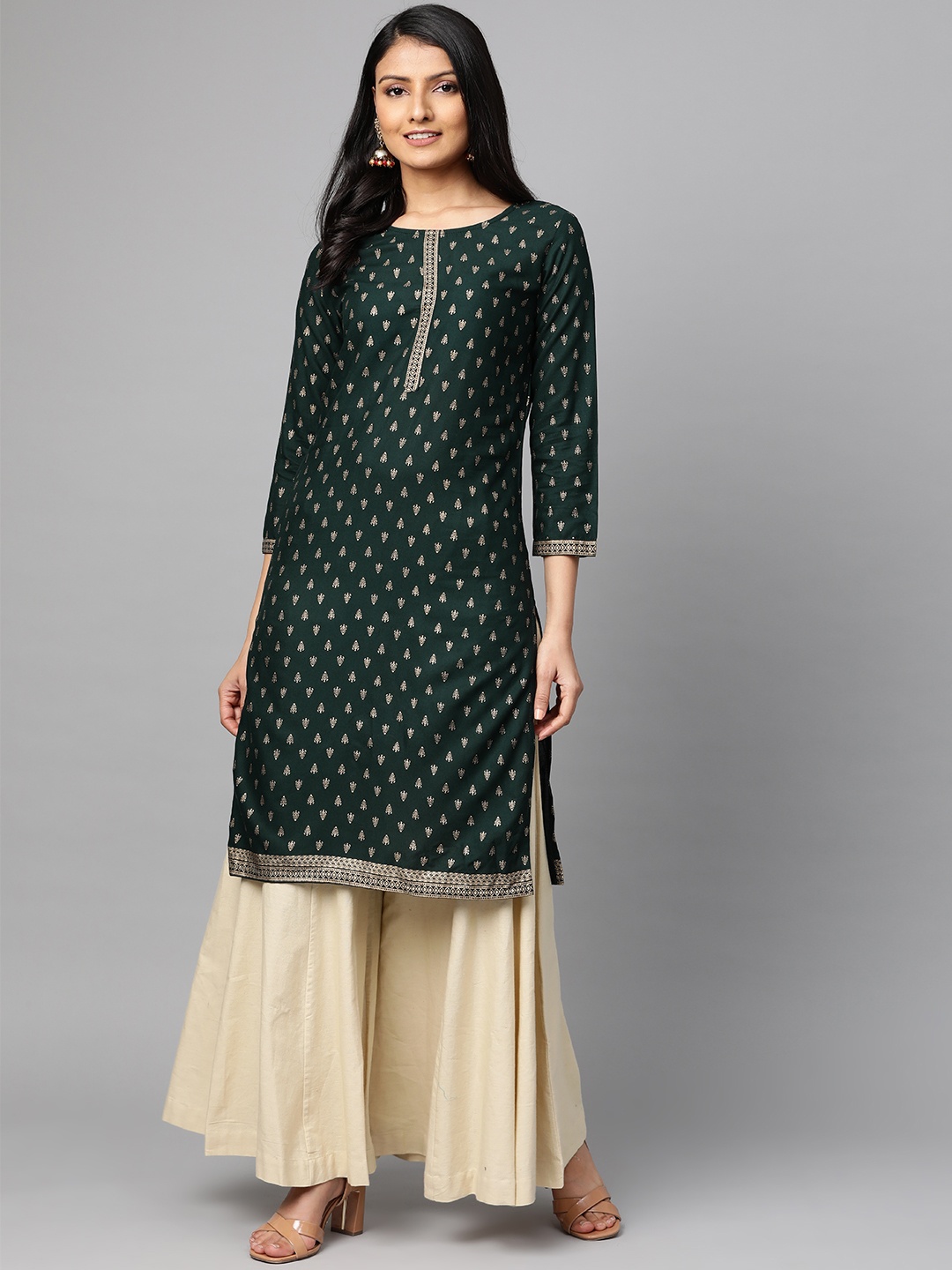 

Meeranshi Women Green & Golden Printed Straight Kurta