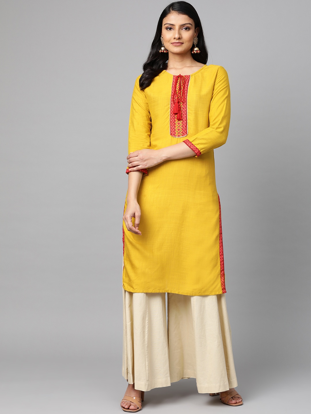 

Meeranshi Women Mustard Yellow & Pink Yoke Design Straight Kurta