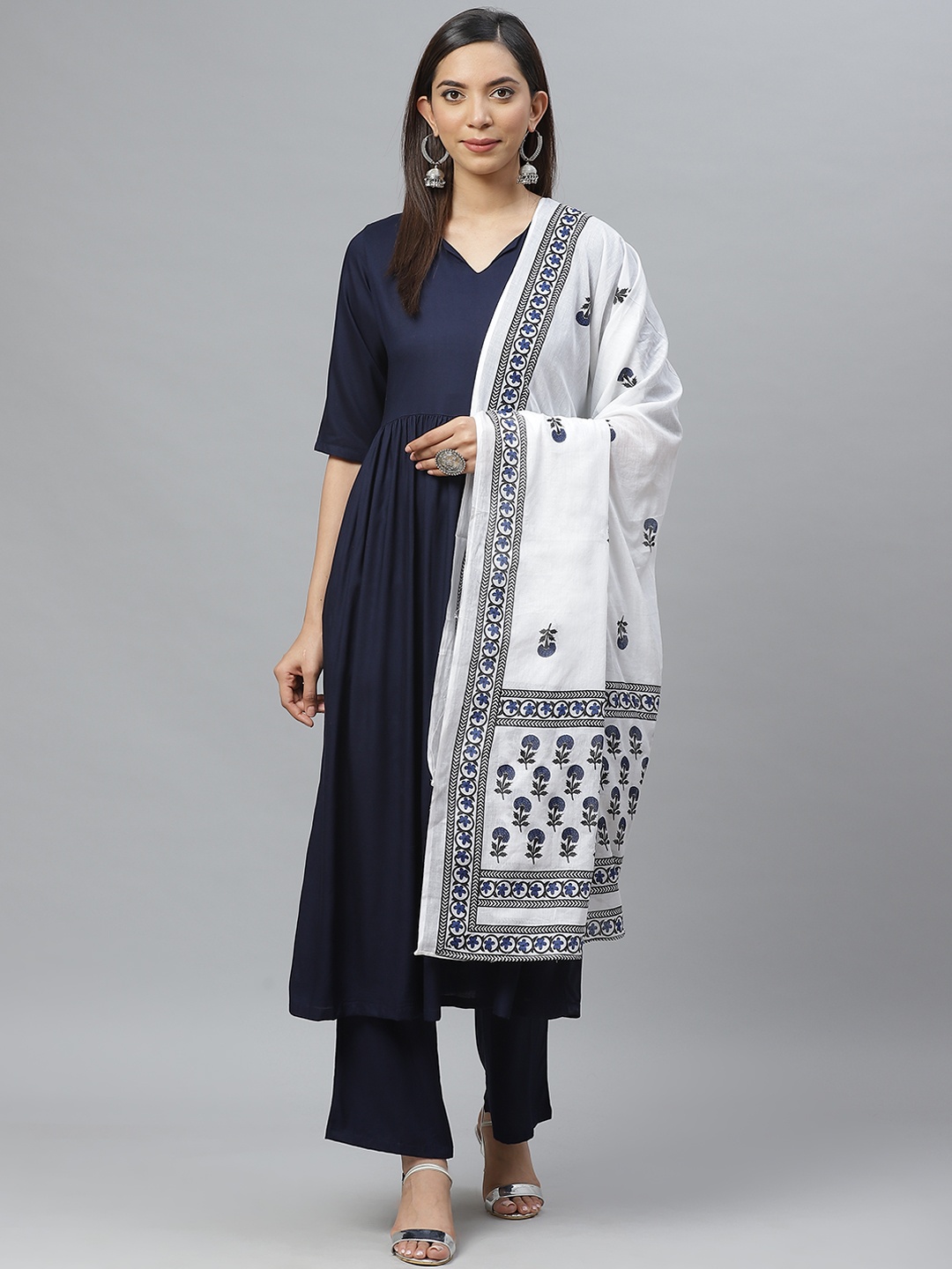 

Ives Women Navy Blue & White Solid Kurta with Palazzos & Dupatta