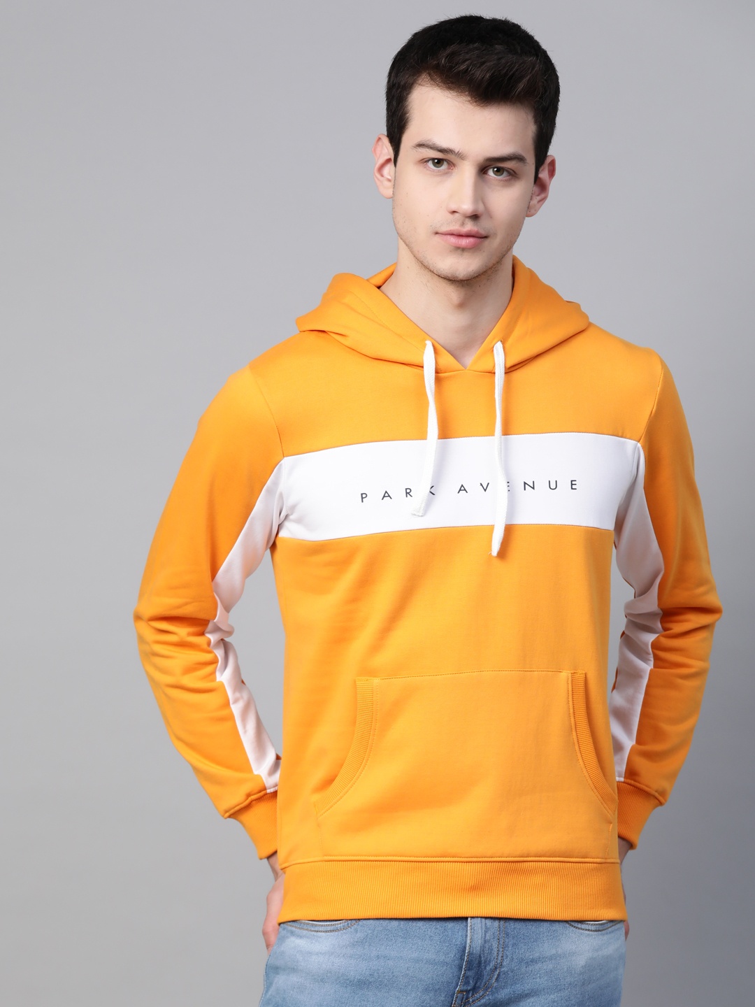 

Park Avenue Men Yellow & White Printed Hooded Sweatshirt