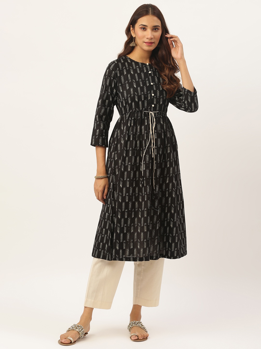 

Aayna Women Black & Off White Ikat Print Kurta with Tapered Pants