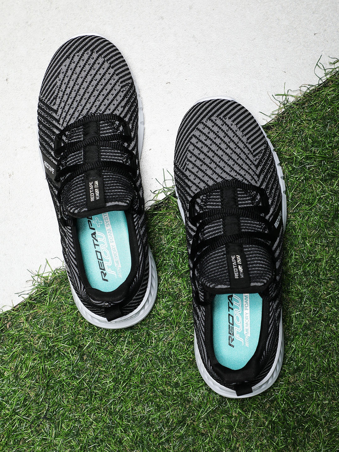 

Red Tape Women Black Textile Walking Shoes