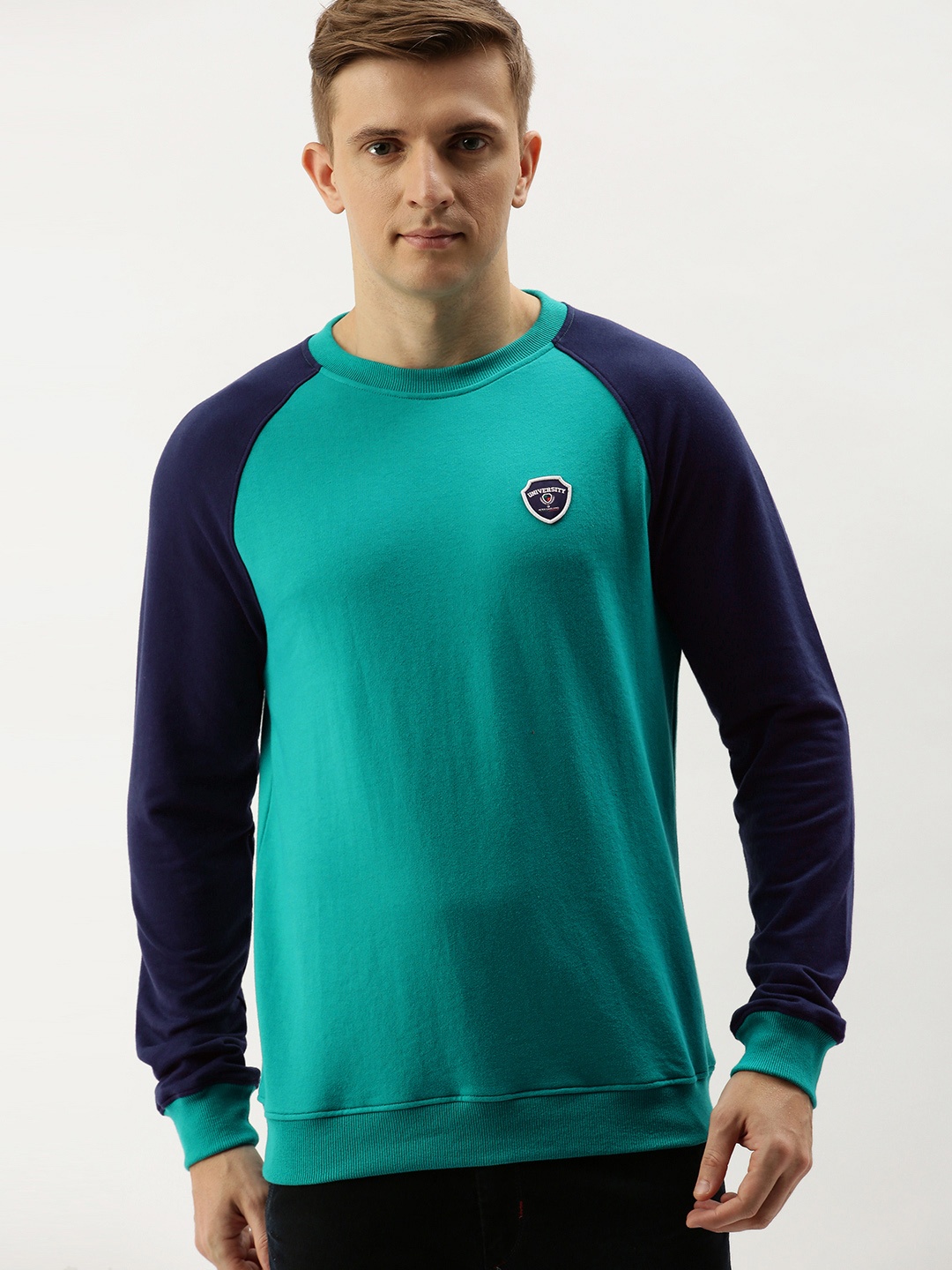 

PETER ENGLAND UNIVERSITY Men Teal Green & Blue Solid Sweatshirt