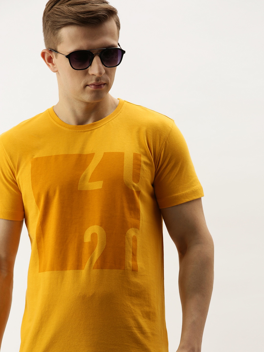 

PETER ENGLAND UNIVERSITY Men Yellow Printed Round Neck T-shirt