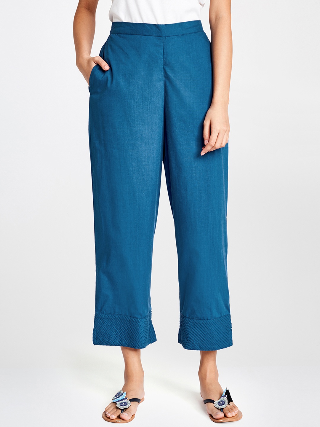 

Global Desi Women Teal Blue Regular Fit Solid Cropped Regular Trousers