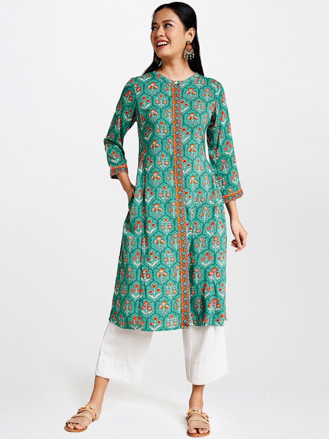 

Global Desi Women Sea Green & Orange Floral Printed A-Line Kurta