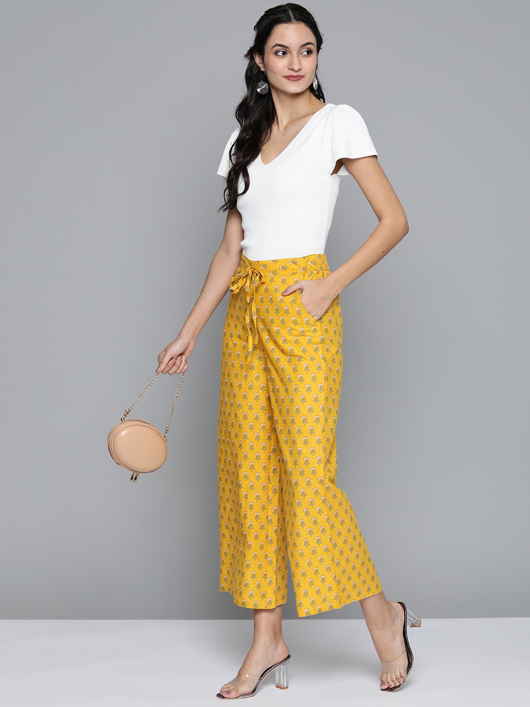 HERE&NOW Women Yellow & Off-White Ethnic Print Wide Leg Cropped Palazzos
HERE&NOW Women Yellow & Off-White Ethnic Print Wide Leg Cropped Palazzos