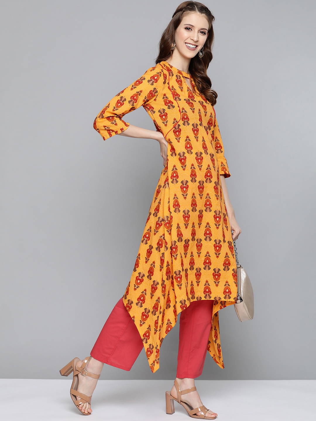 

HERE&NOW Women Mustard Yellow & Orange Printed Asymmetric A-Line Kurta