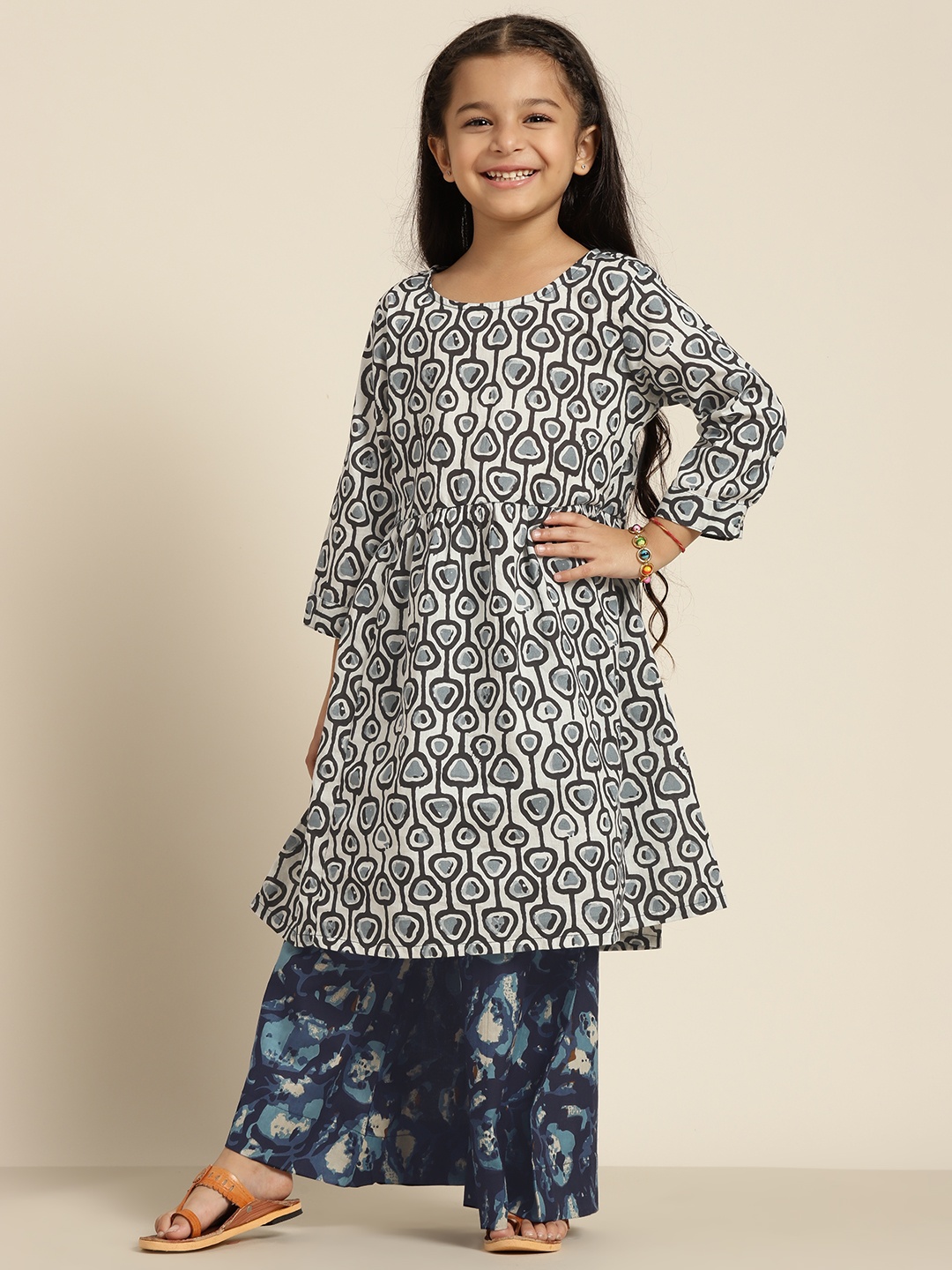 

Sangria Girls White & Blue Abstract Print Pure Cotton Kurta with Palazzos